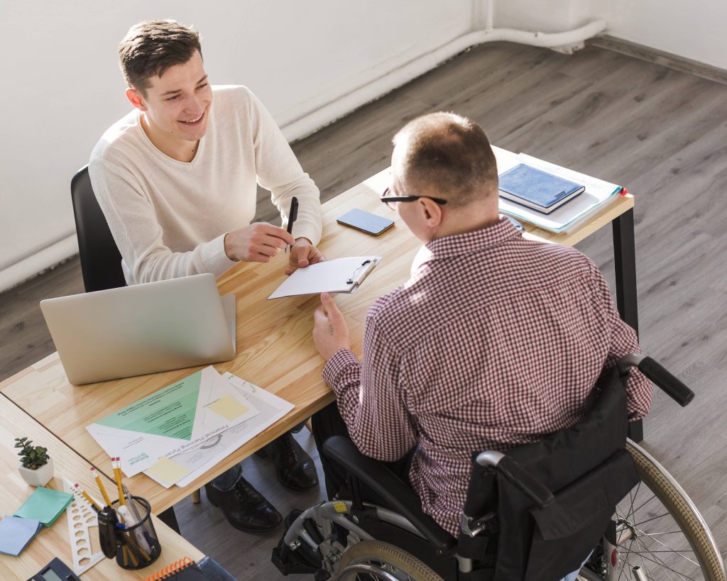 disabled-worker-filling-papers-contract